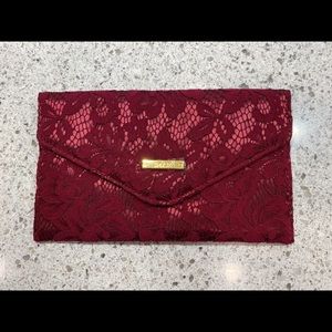 Iman handbag clutch. Burgundy. EUC
